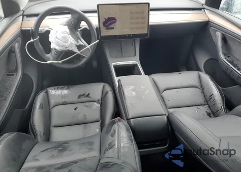 2023 Tesla Model Y from USA, damaged, VIN 7SAYGDEE8PA140884